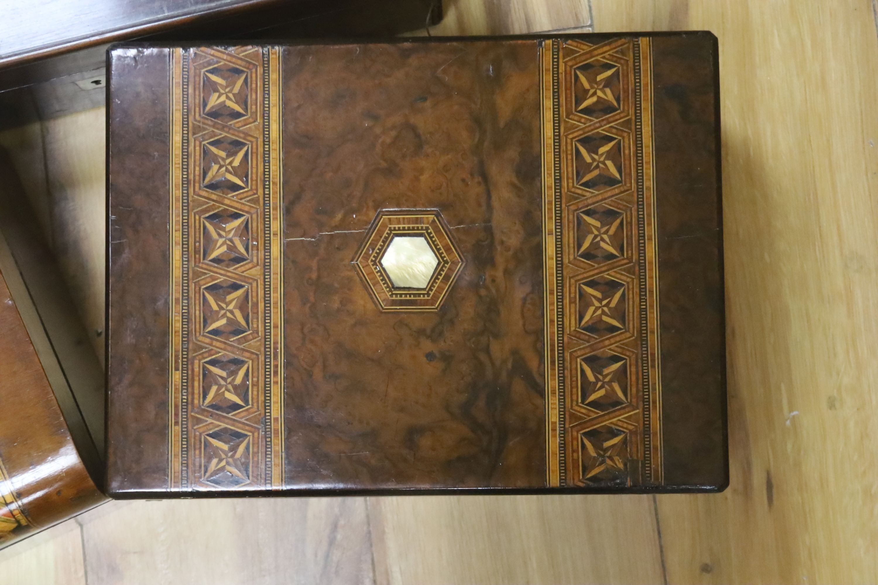 A Victorian rosewood writing box and two Victorian walnut and parquetry boxes